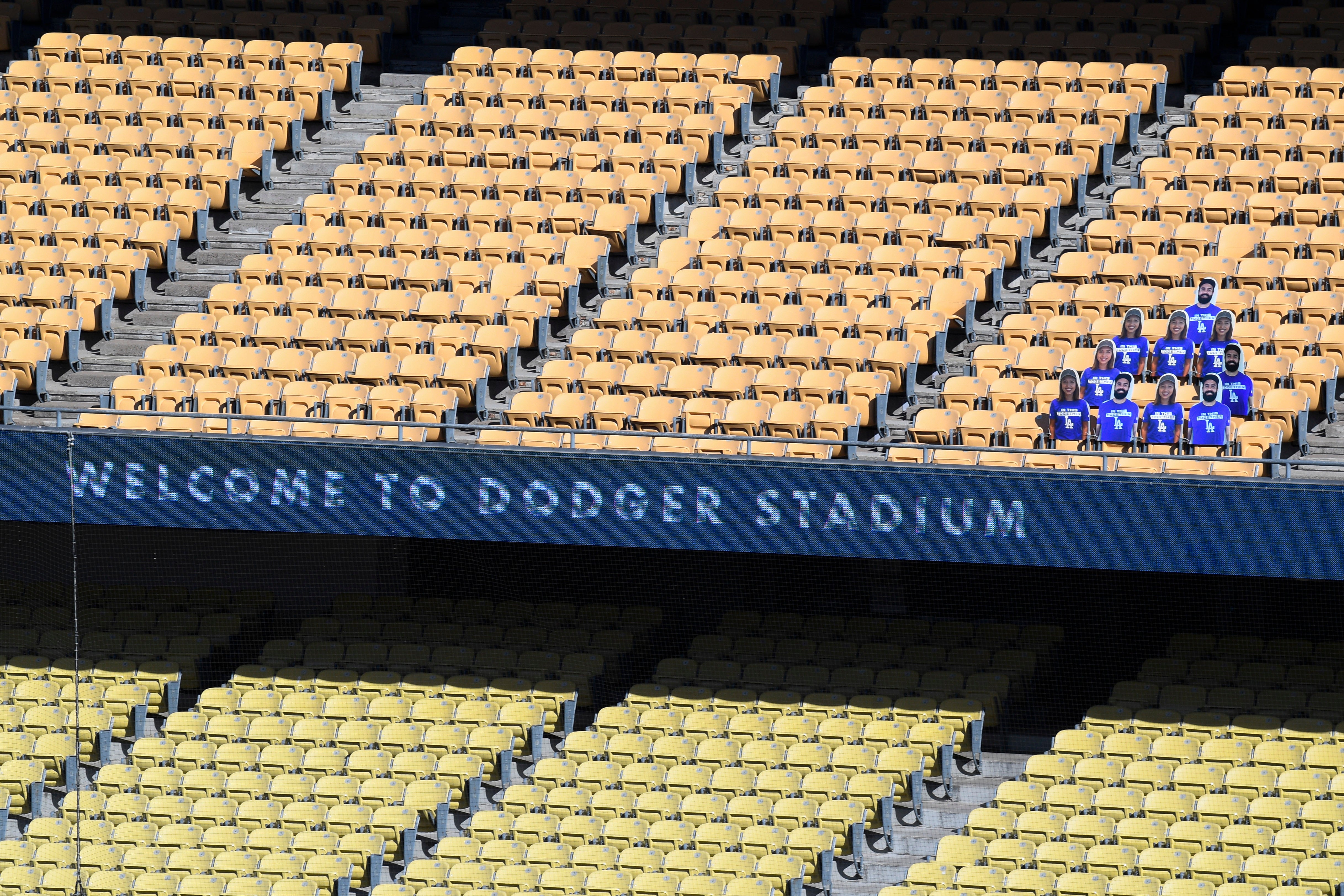Dodger Stadium with cutouts of fans in seats