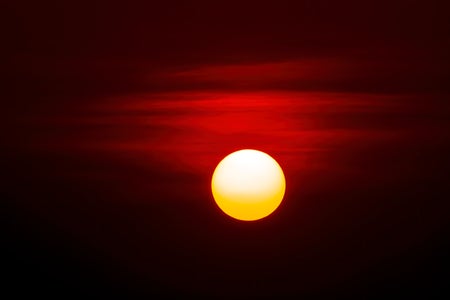 Yellow sun in red sky